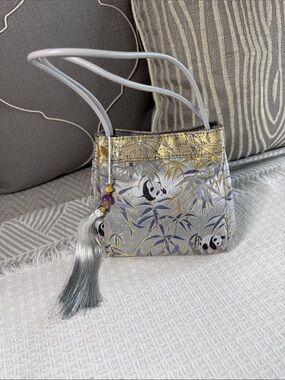 Gold and silver satin Panda Bear print handbag with tassle